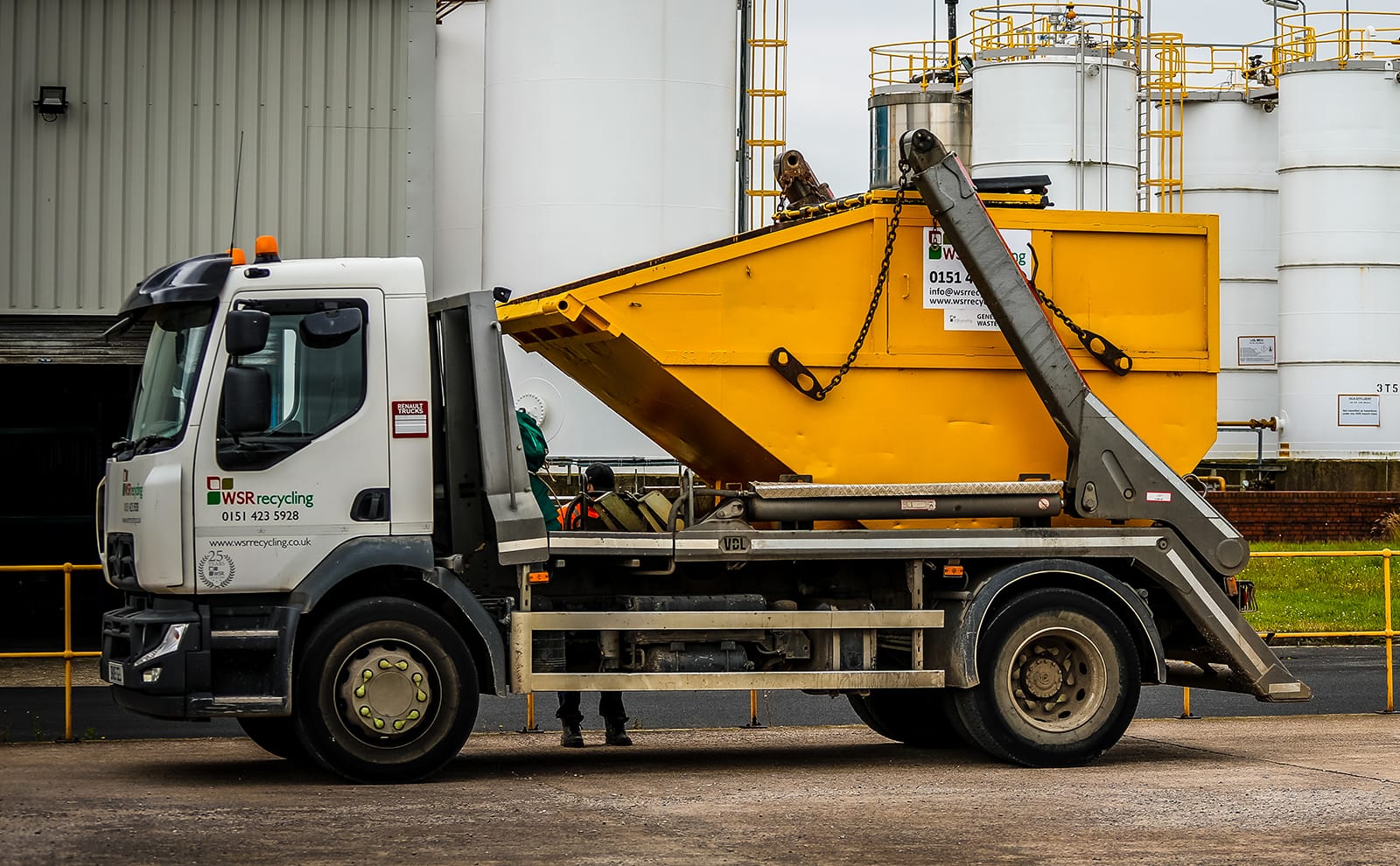WSR Recycling skip hire truck delivering skip in Widnes, Cheshire